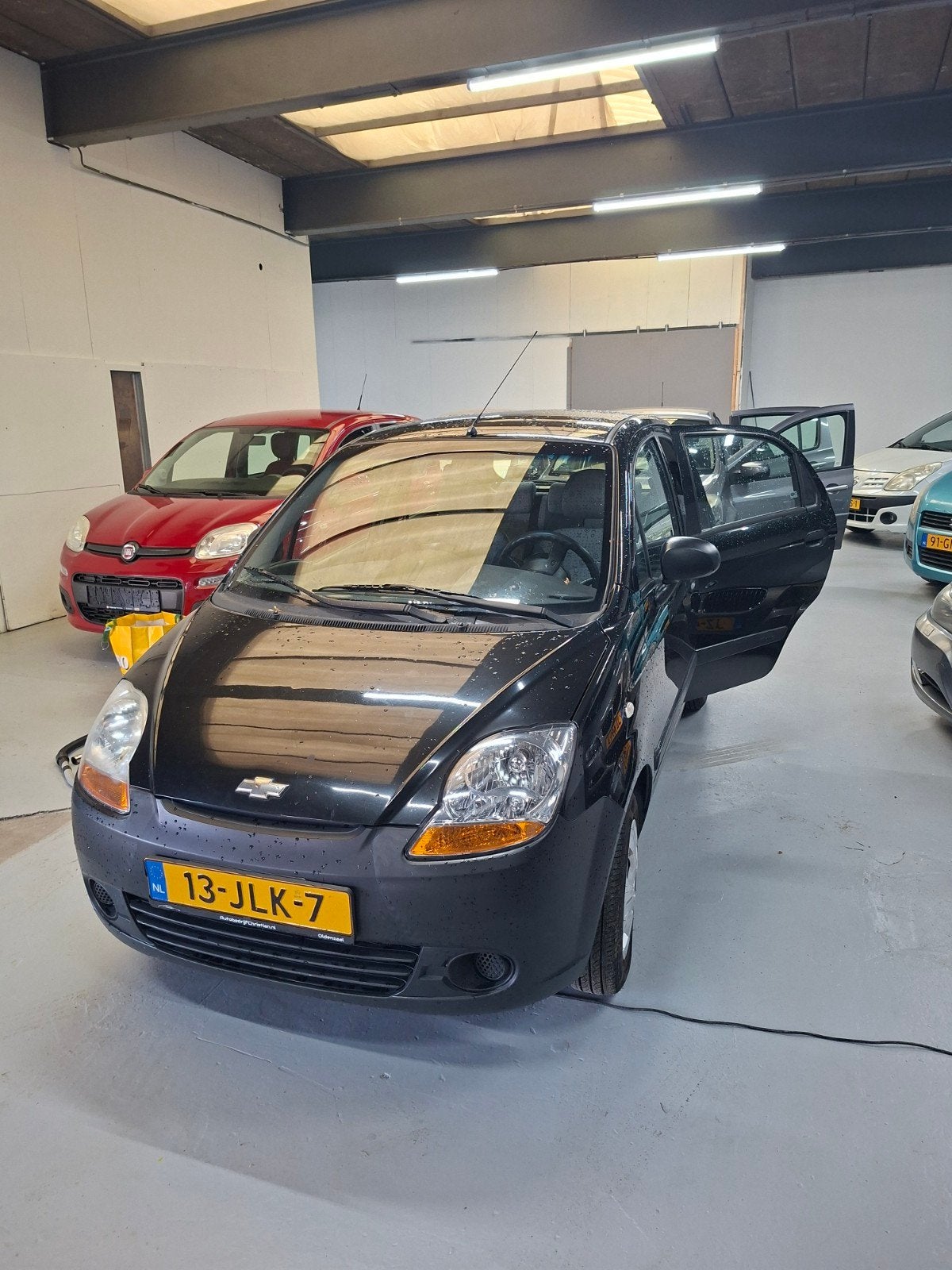 Chevrolet Matiz 0.8 2009 Zwart, Auto's, Voorwielaandrijving, Stof, Zwart, Origineel Nederlands