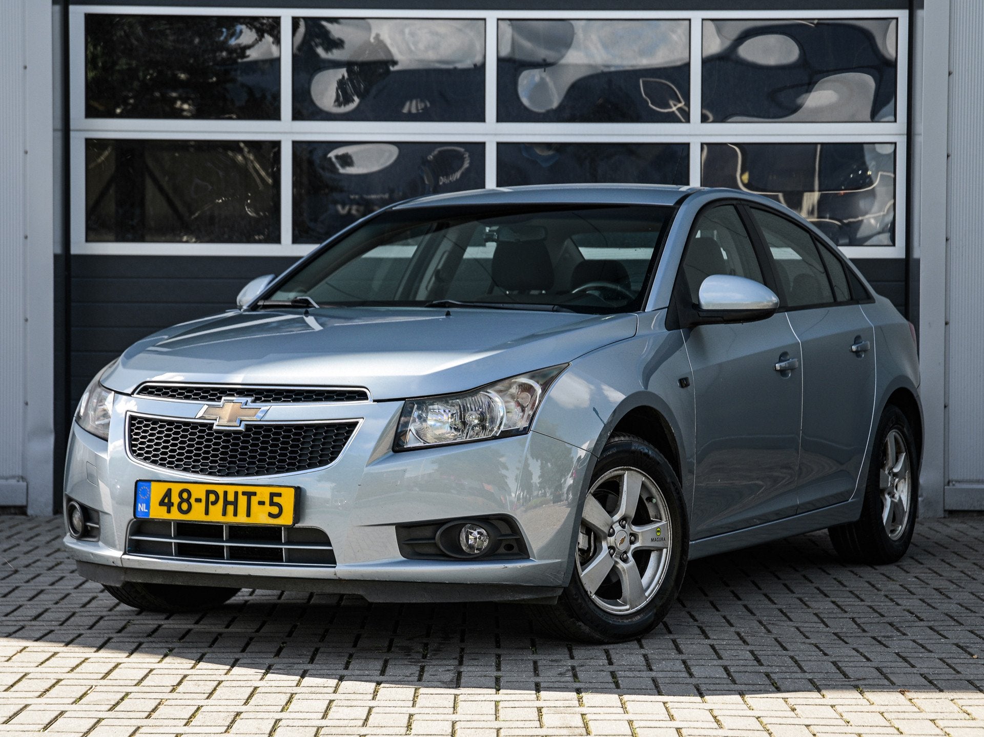 Chevrolet Cruze 1.8 LS | Airco | Carplay | Camera | Trekhaak, Voorwielaandrijving, Euro 5, Gebruikt, Zwart