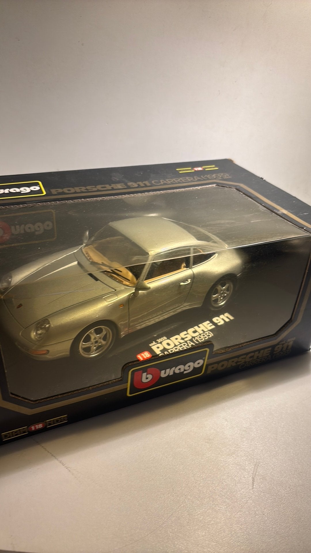 Porsche 911 carrera 1993 Bburago 1.18, Hobby en Vrije tijd, Ophalen of Verzenden, Bburago, A, A