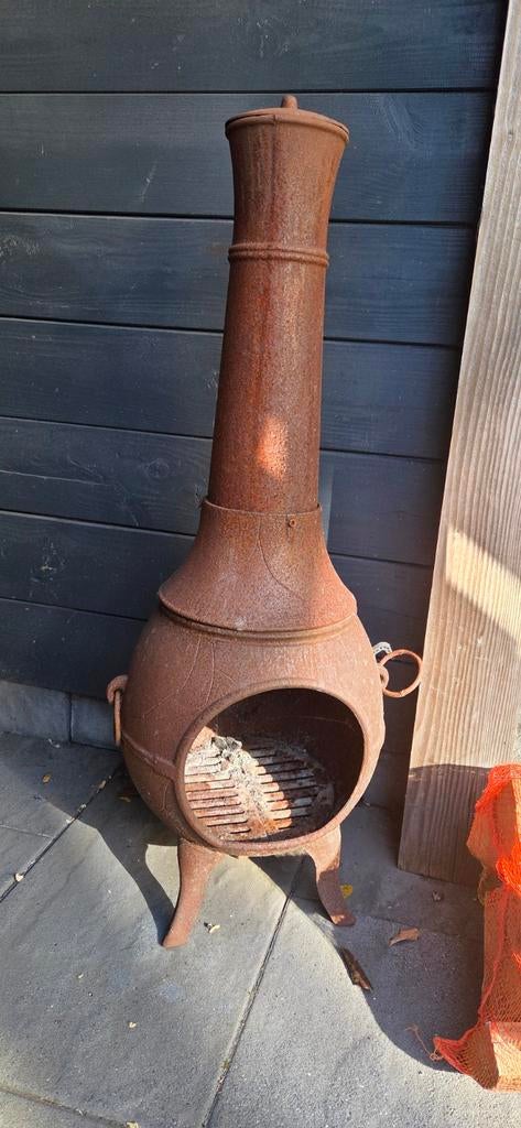 Gietijzeren terraskachel incl. 3 zakken haardhout, Tuin en Terras, Ophalen