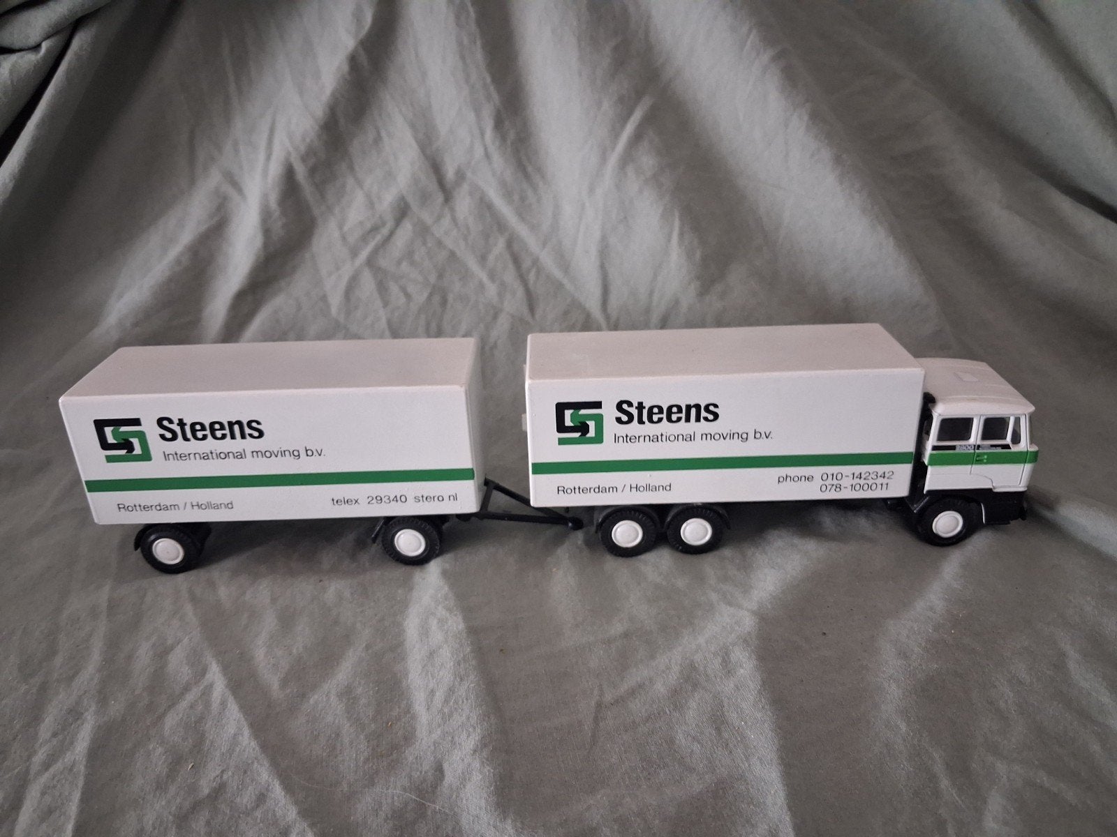DAF 2800 Steens International Moving b.v. model, Hobby en Vrije tijd, Modelauto's | 1:50, Zo goed als nieuw, Overige merken, Ophalen of Verzenden