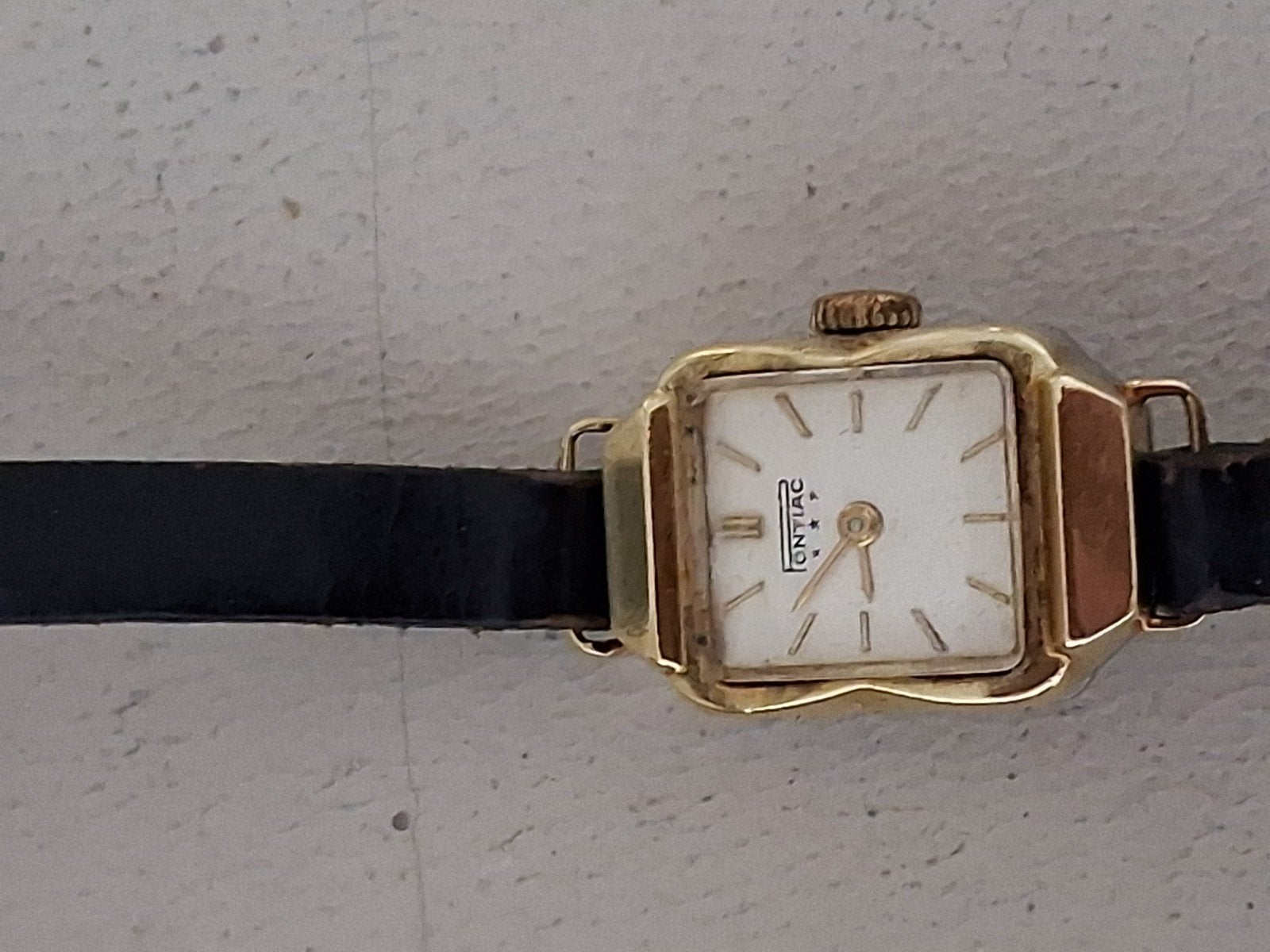 Pontiac 14 karaat goud dames horloge.met metalen schterkant, Ophalen of Verzenden, Goud, Overige typen