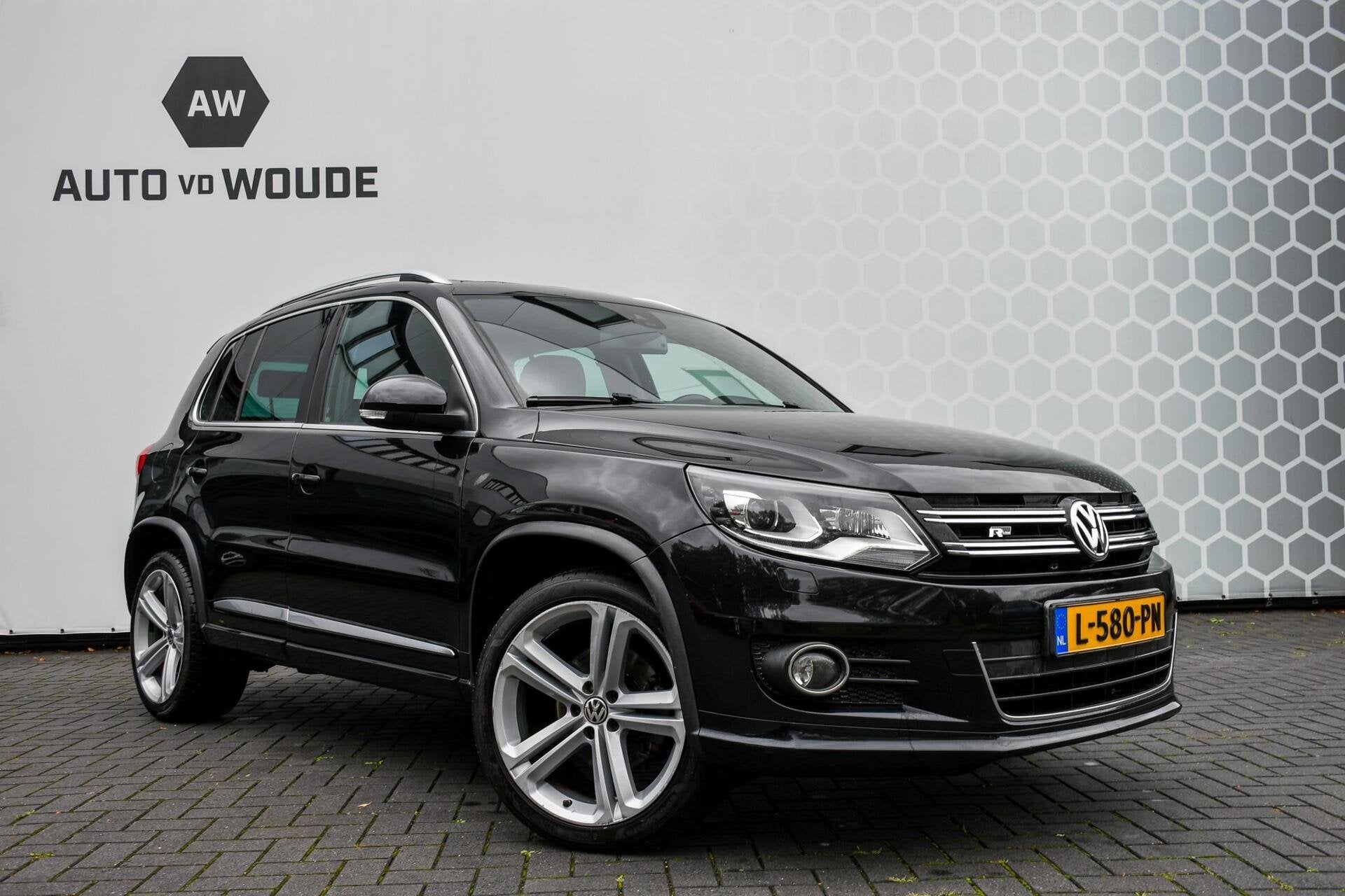 Volkswagen Tiguan 2.0 TSI Sport&Style 4Motion R-line, Auto's, Automaat, Euro 5, Stof, Gebruikt