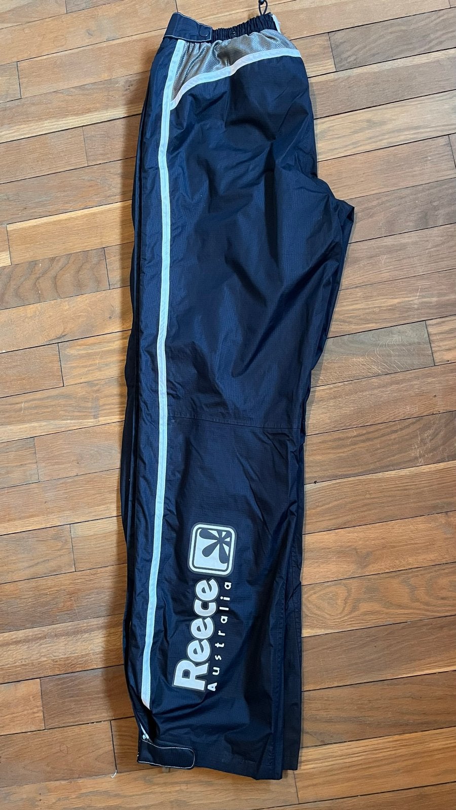 Reece Regenbroek Trainingsbroek Maat L - als Nieuw!, Maat 52/54 (L), Zwart, Ophalen of Verzenden, Zo goed als nieuw