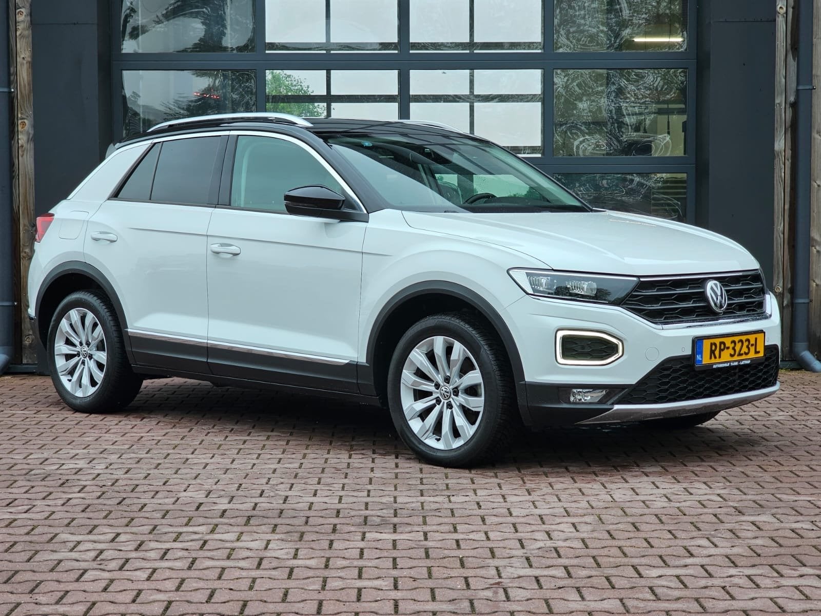 Volkswagen T-Roc 2.0 TSI 190PK 4Motion Sport | Automaat | LE, Auto's, Automaat, Gebruikt, Euro 6, Wit