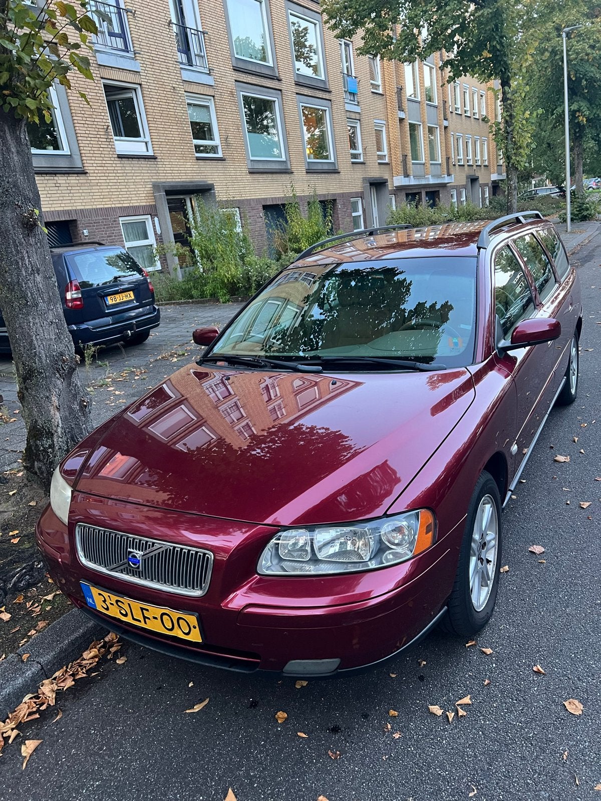Volvo V70 2.4 140PK AUT 2004 Rood, Auto's, 1800 kg, Beige, Leder en Stof, Stationwagon