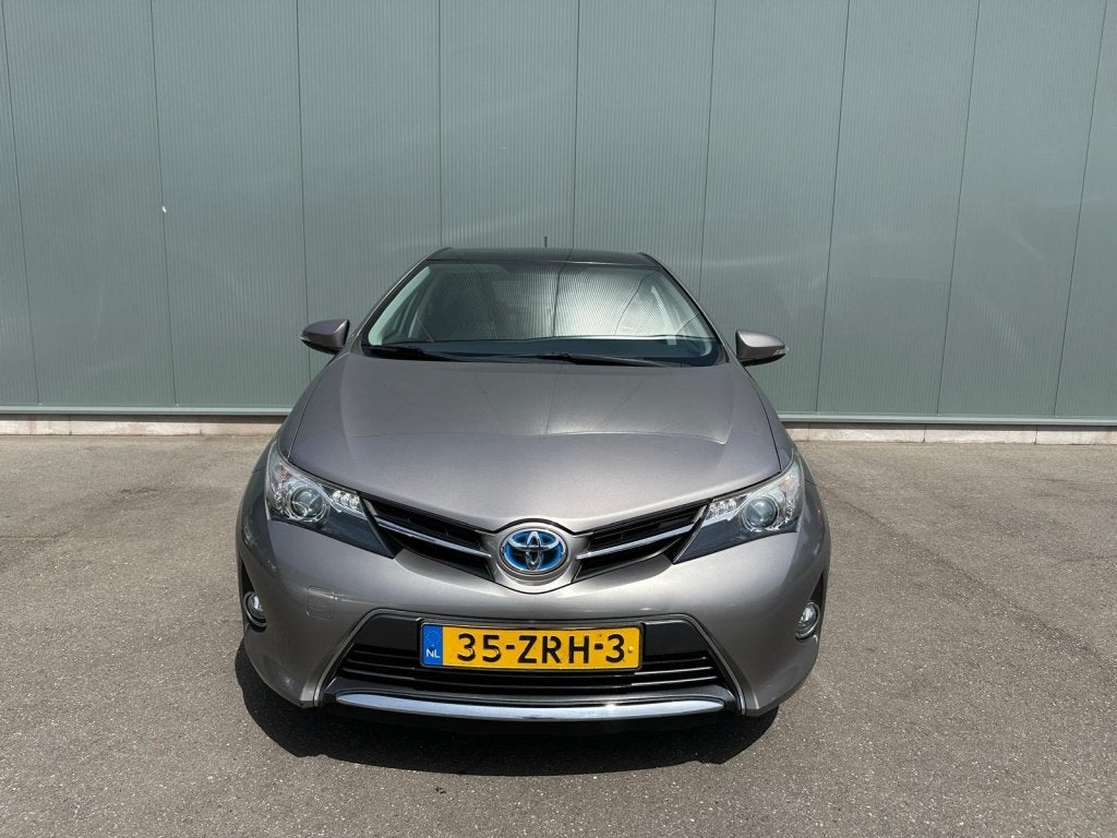 Toyota Auris 1.8 Hybrid Lease PANORAMADAK | CAMERA | NAP !, Auto's, Euro 5, 4 cilinders, Bruin, Origineel Nederlands