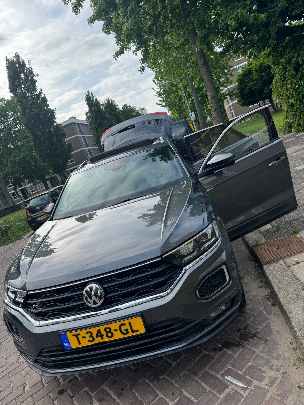 Volkswagen T-Roc 1.5 TSI 150pk 7-DSG 2019 Grijs, Auto's, Voorwielaandrijving, 1498 cc, 4 cilinders, Leder en Stof