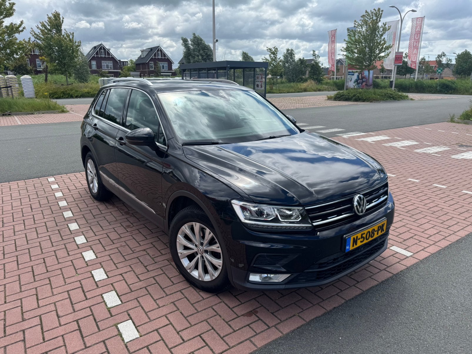 Volkswagen Tiguan 1.4 TSI Highline 110KW/150PK 6DSG, 1800 kg, 4 cilinders, Zwart, Particulier