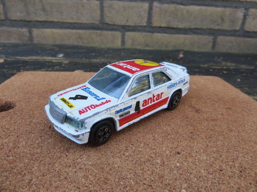 Burago Mercedes 190E ANTAR wit 1:43, Hobby en Vrije tijd, Modelauto's | 1:43, Ophalen of Verzenden, Gebruikt, Auto, Overige merken