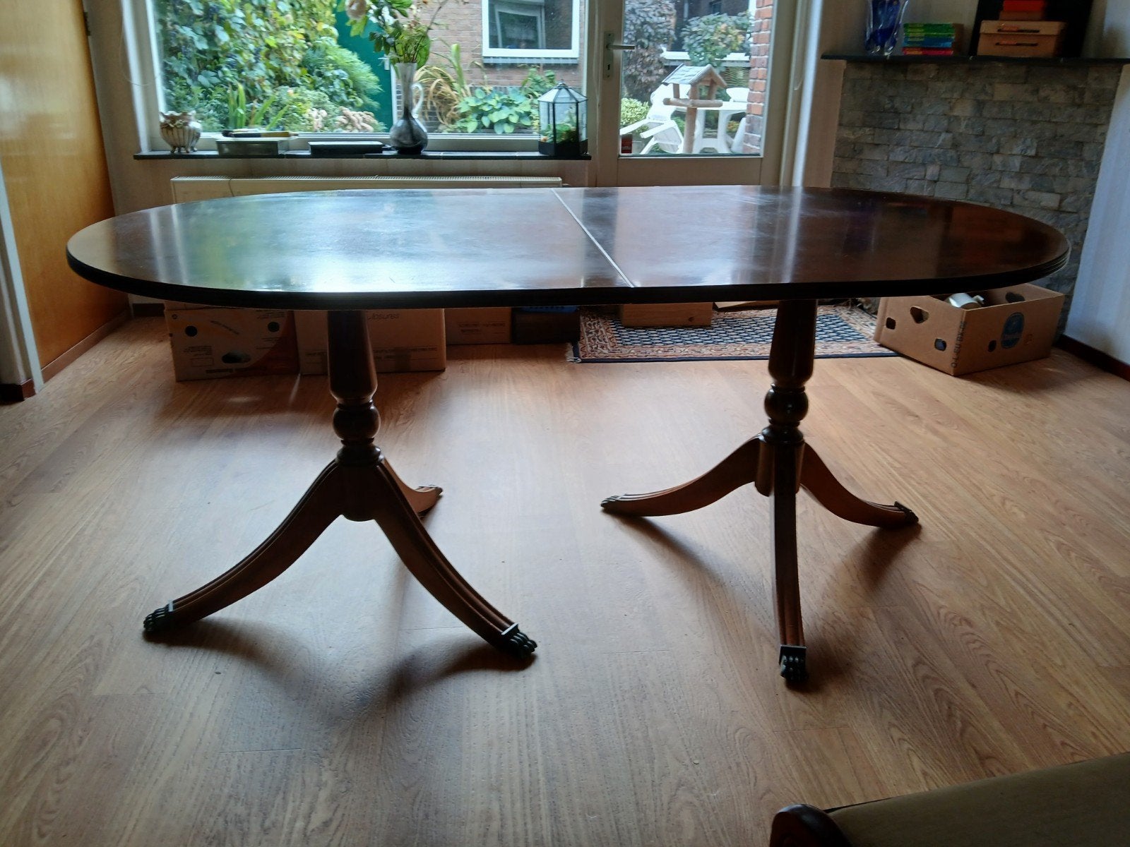 Klassieke ovale eettafel met twee kolommen, Ophalen