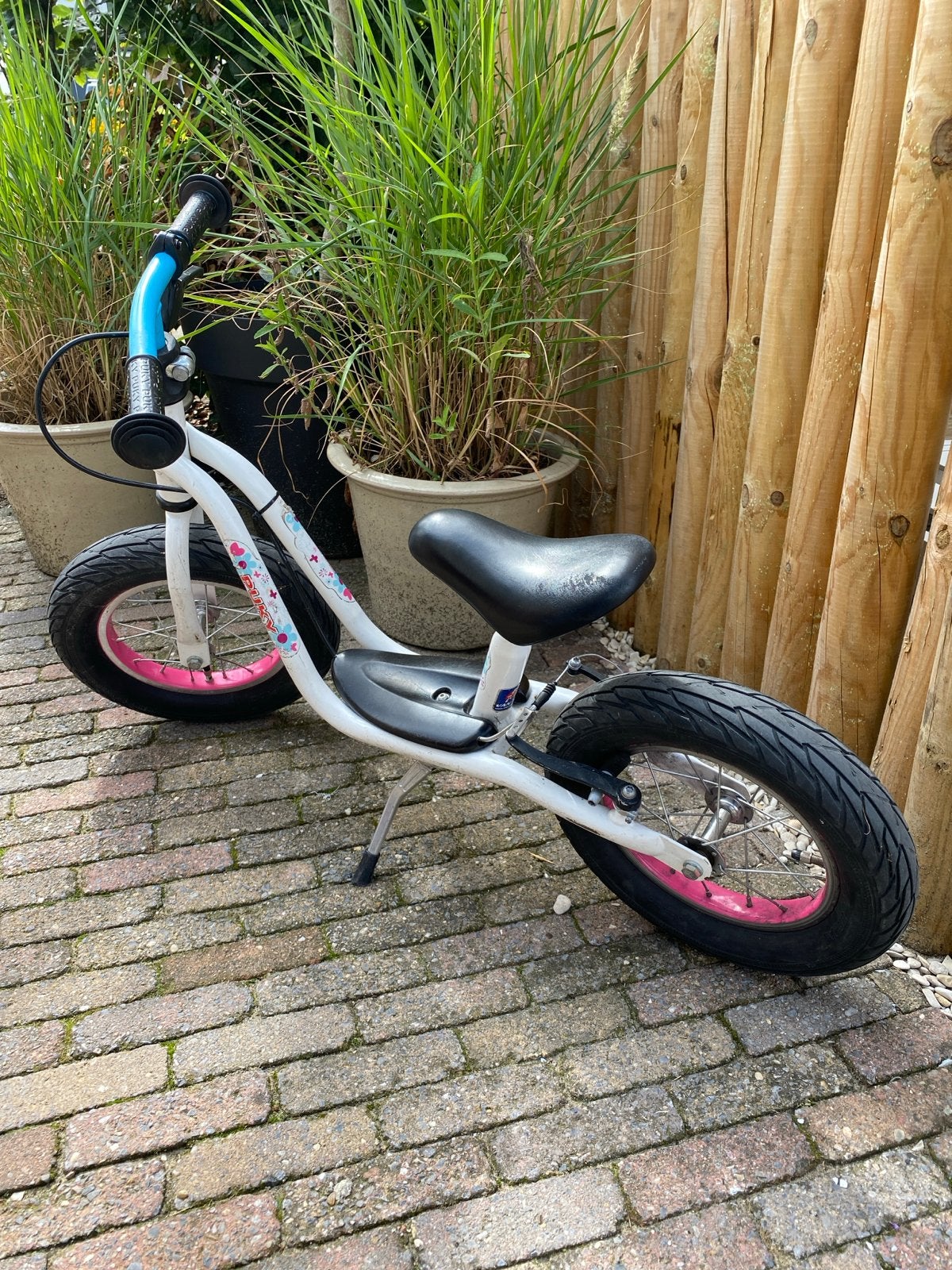 Gebruikte Puky loopfiets wit/roze - 12 inch, Ophalen of Verzenden, Gebruikt, Velgrem, Minder dan 16 inch