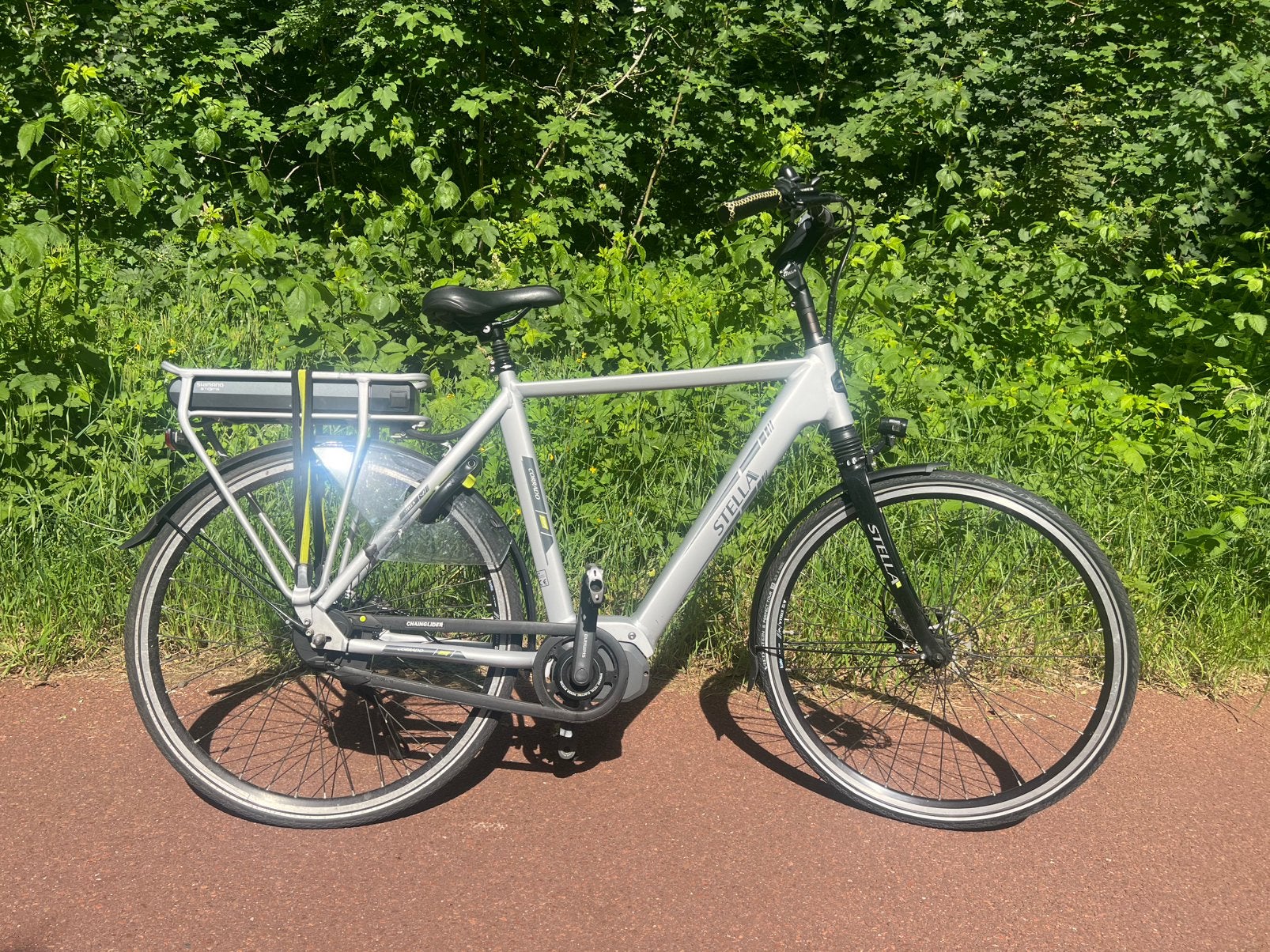 Stella elektrische herenfiets middenmotor, 55 tot 59 cm, Ophalen of Verzenden, Zo goed als nieuw, Overige merken