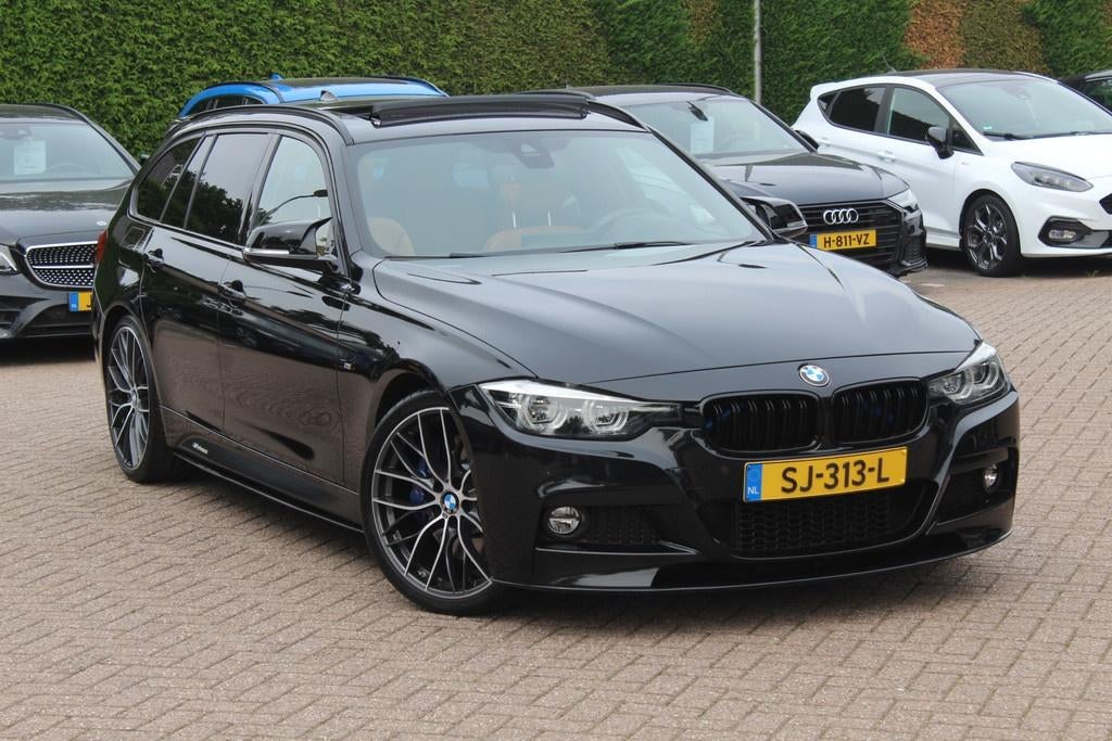 BMW 330i Touring M-Sport | Pano | heads-up | Digi-cluster |, Achterwielaandrijving, 1800 kg, 4 cilinders, Zwart