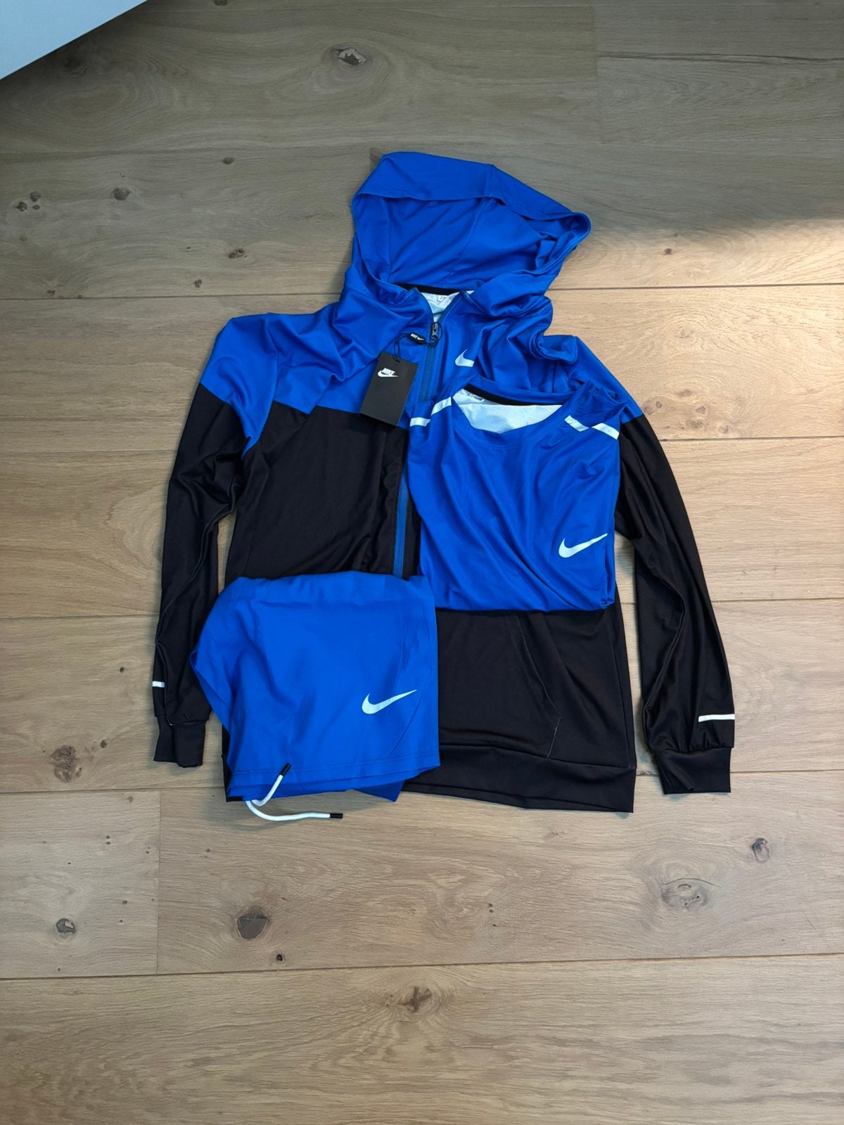 Nike Miller set | Maat L, Ophalen of Verzenden, Nieuw, Regenjas