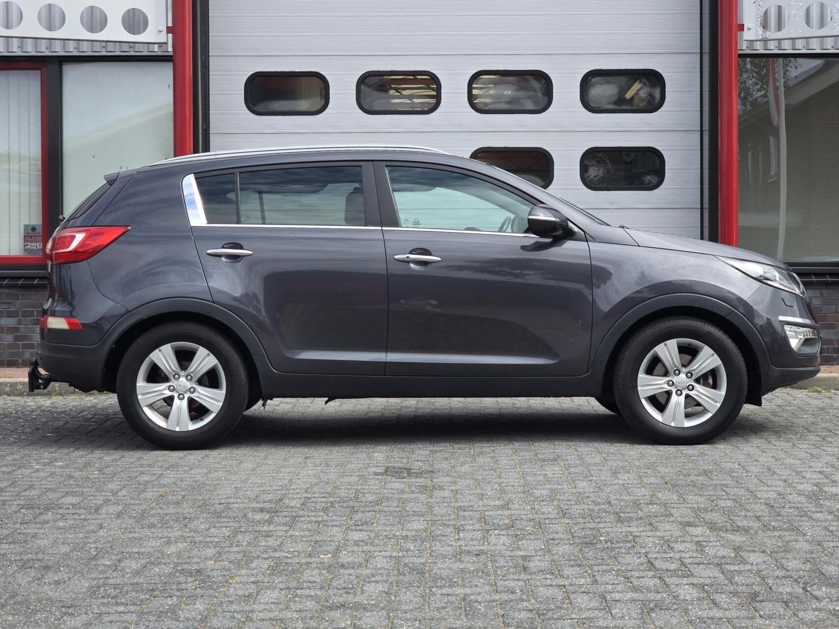 Kia Sportage 1.6 GDI X-ecutive Plus Pack Navi/Pano/Xenon/PDC, Auto's, Voorwielaandrijving, Euro 5, 4 cilinders, Met garantie (alle)