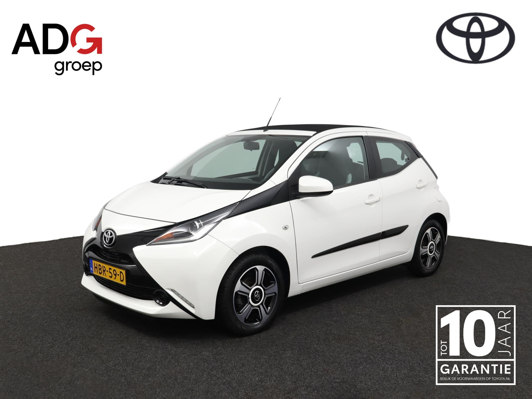 Toyota Aygo 1.0 VVT-i x-cite | Cabrio dak | Achteruitrijcame, Auto's, Toyota, 12 maanden, Stof, Gebruikt, 4 stoelen