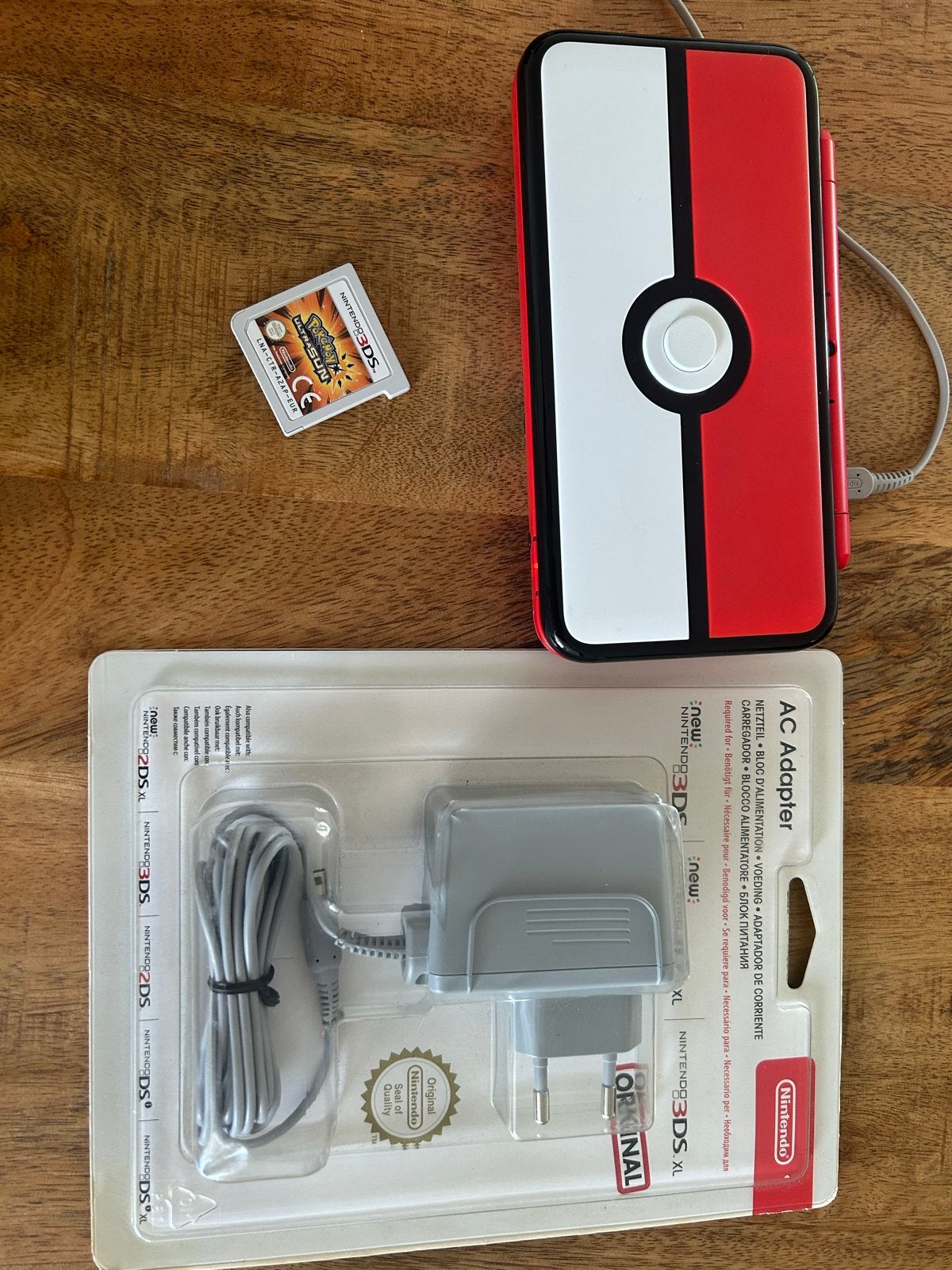 Nintendo New 2DS XL Pokeball Edition + Pokemon Ultra Sun, Spelcomputers en Games, Ophalen, Met games, 2DS XL, Zo goed als nieuw