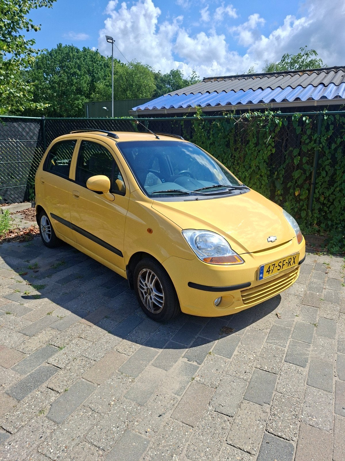 Chevrolet Matiz 1.0 2005 Geel, Auto's, Voorwielaandrijving, Stof, 600 kg, 400 kg