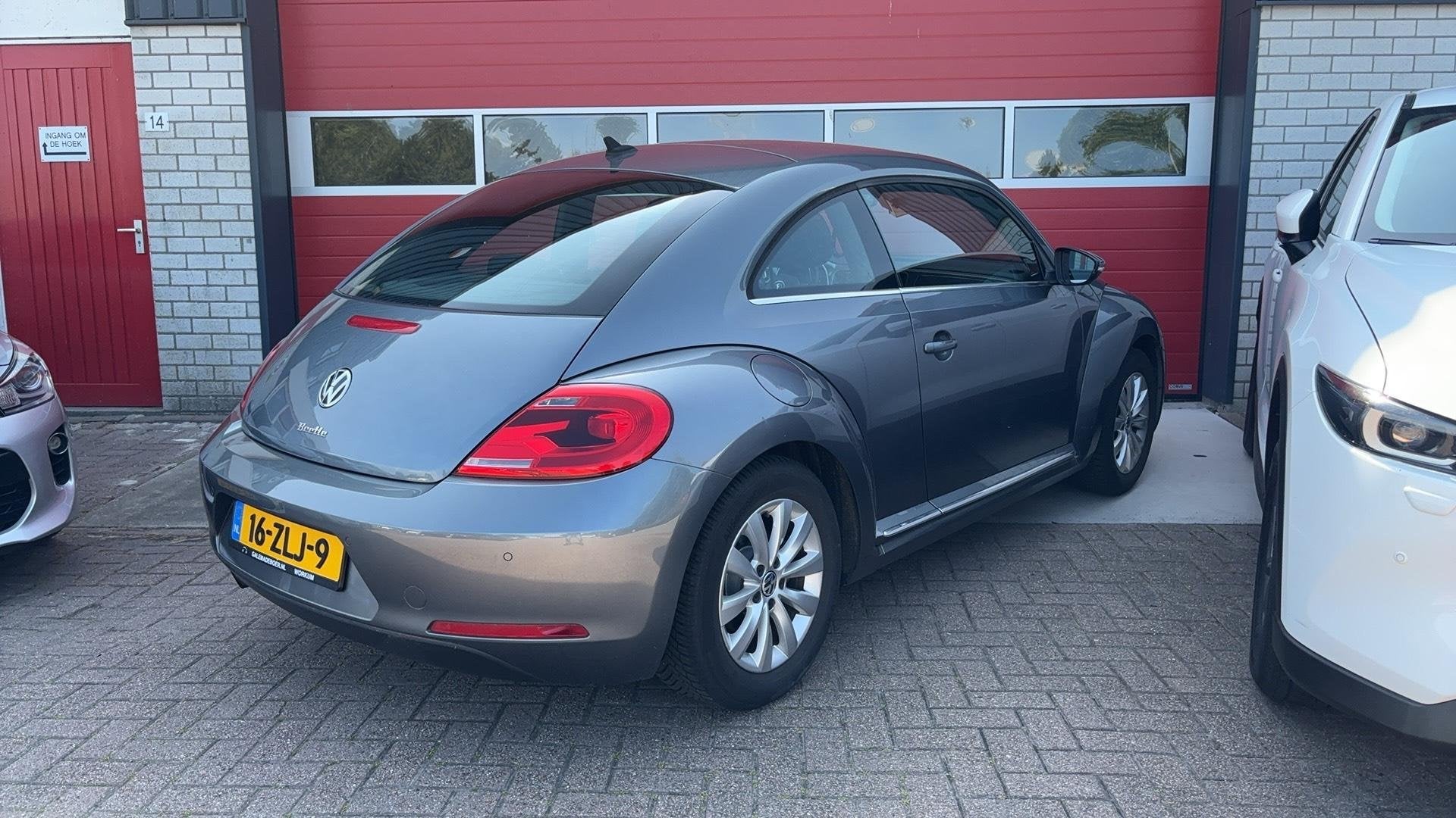 Volkswagen Beetle 1.2 TSI Design NAVI / CLIMA / PDC / BLUETO, Voorwielaandrijving, Euro 5, Stof, Gebruikt