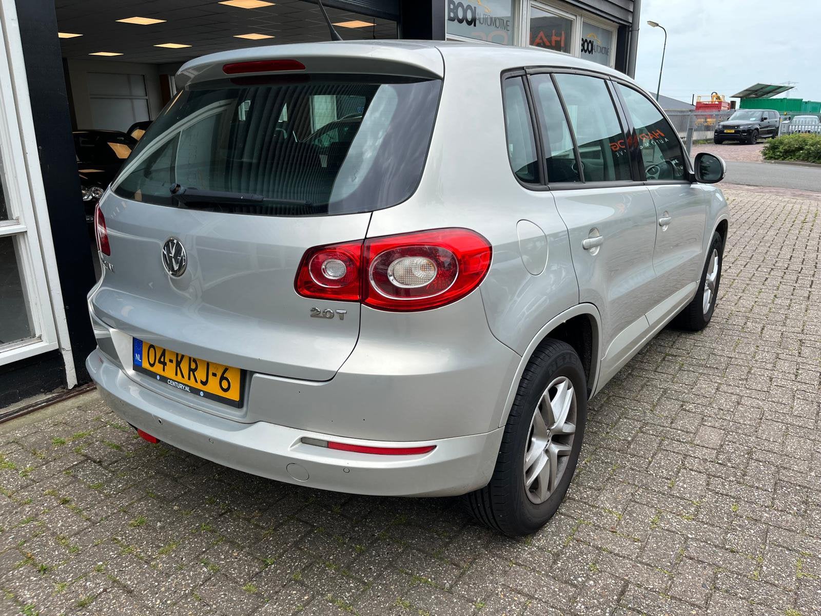 Volkswagen Tiguan 2.0 tsi track & field 4 motion automaat, Auto's, Automaat, Stof, Zwart, 1984 cc