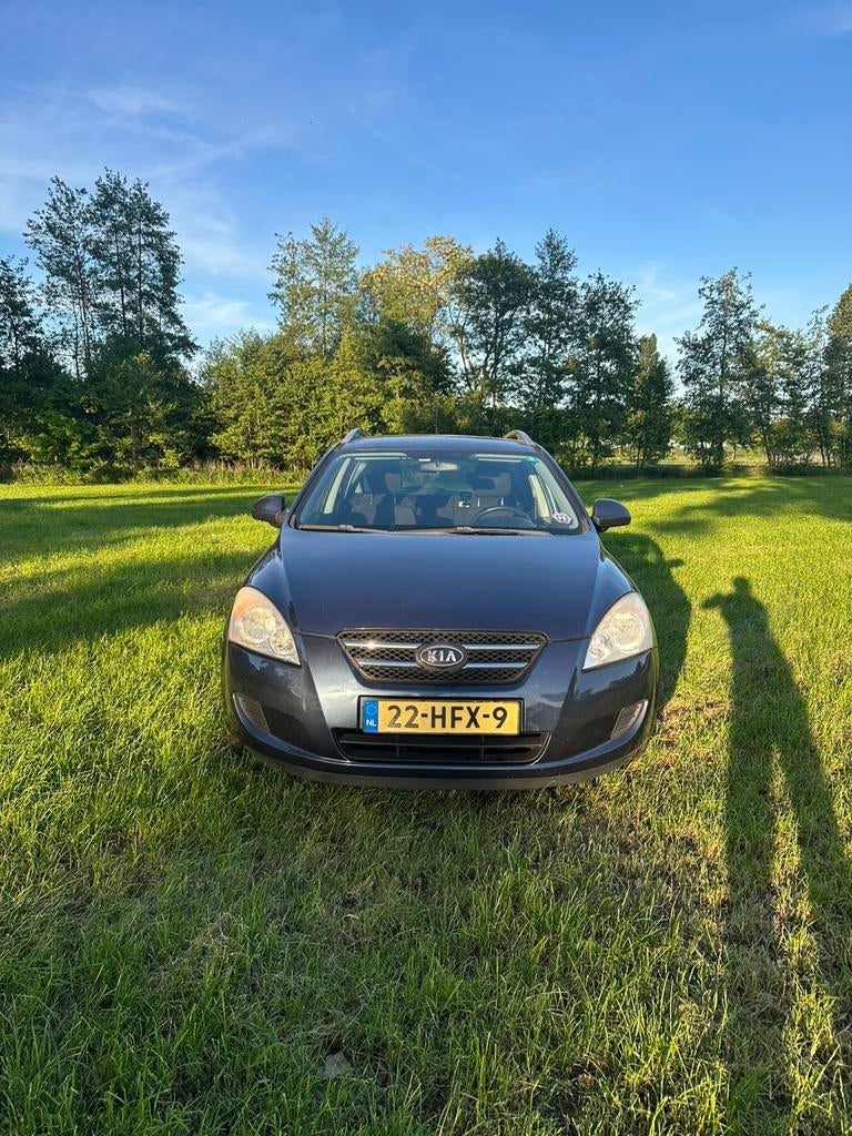 Kia Cee d 1.4 Sporty Wagon 2009 Blauw, Auto's, Voorwielaandrijving, 4 cilinders, 1396 cc, Blauw