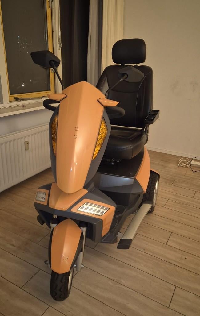 Travelux infineon 3 Scootmobiel Oranje, Ophalen, Zo goed als nieuw, 46 km of meer, 10 km/u of minder