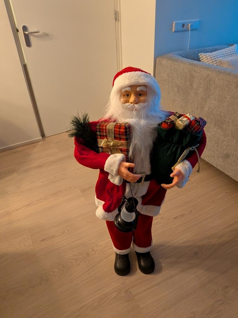 Kerstman+ Tas er bij, Ophalen