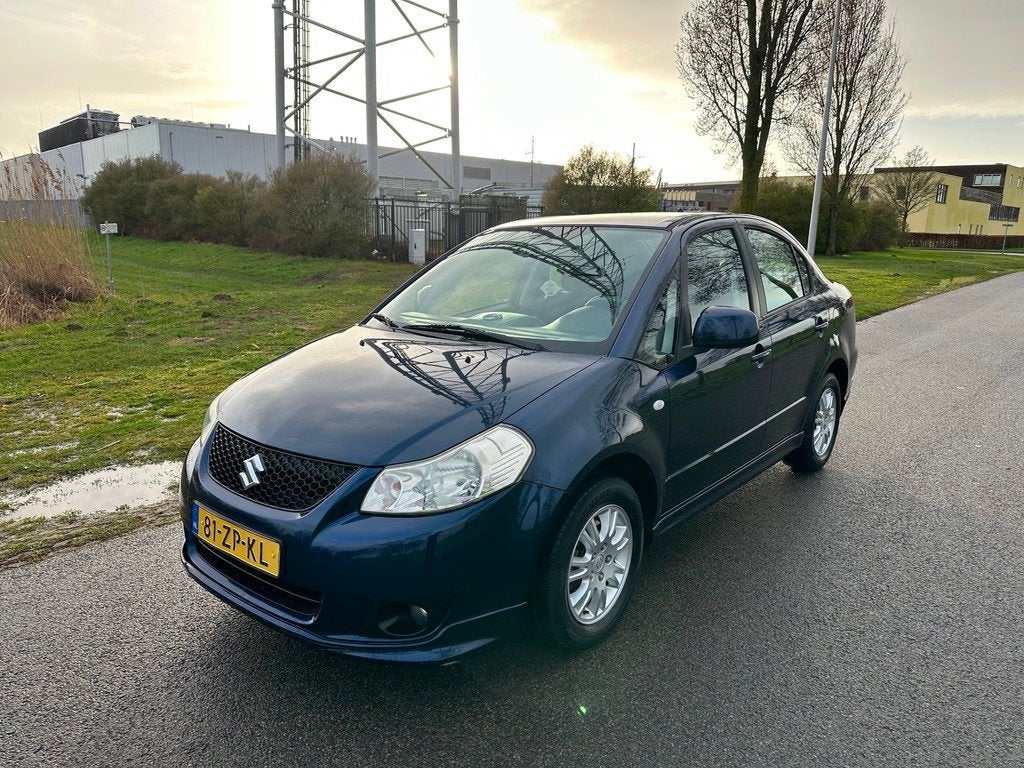 Suzuki SX4 1.6 Exclusive Airco Trekhaak Keyless Nieuwe APK, Auto's, Suzuki, 15 km/l, Gebruikt, 4 cilinders, 49 €/maand