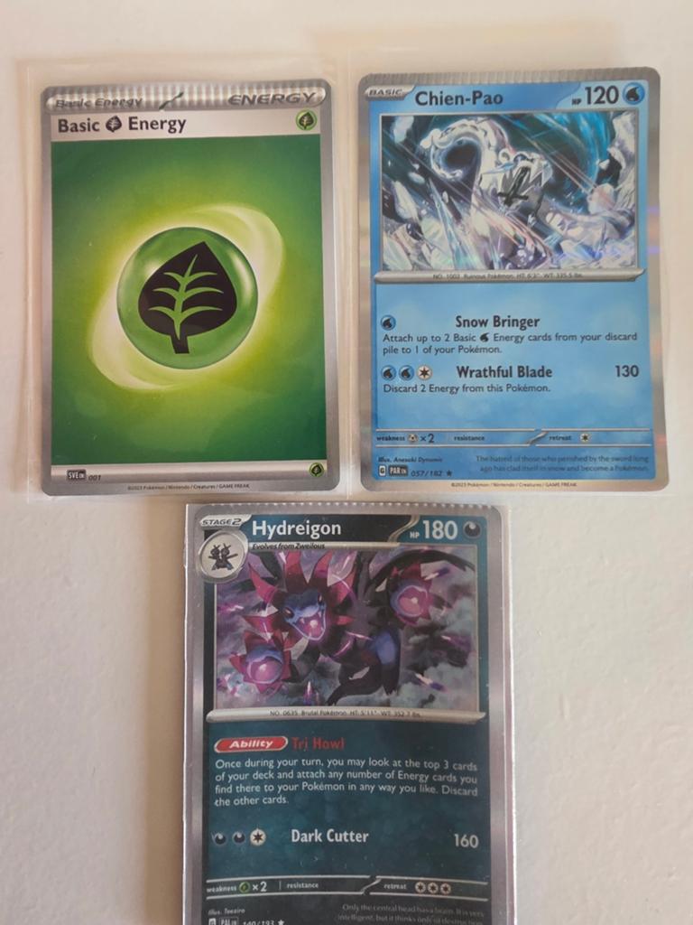 Crimp error pokemon holo chien pao/hydreigon en gras energie, Ophalen of Verzenden, Zo goed als nieuw