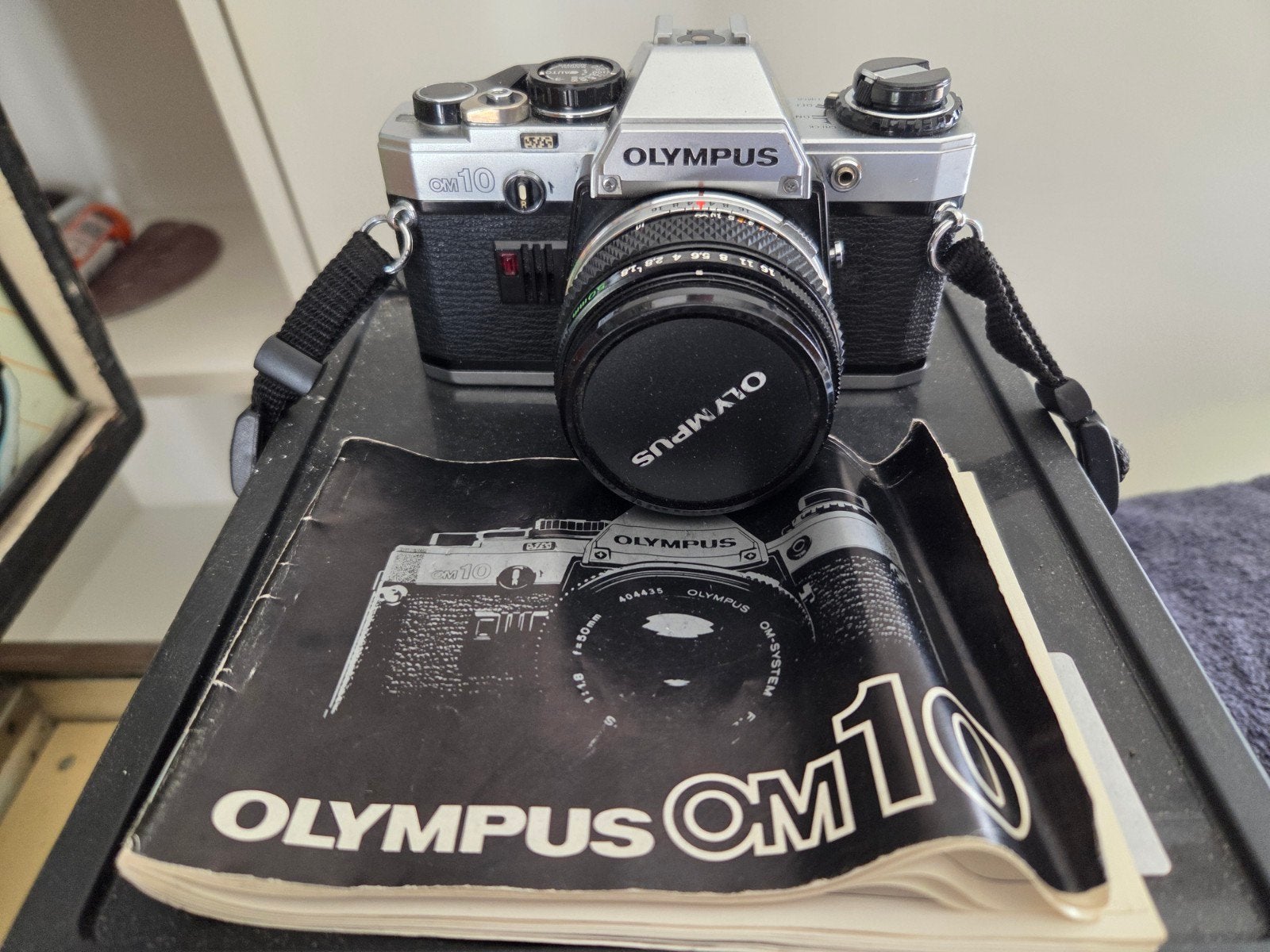 Olympus OM10 Spiegelreflexcamera met handleiding, Audio, Tv en Foto, Ophalen of Verzenden