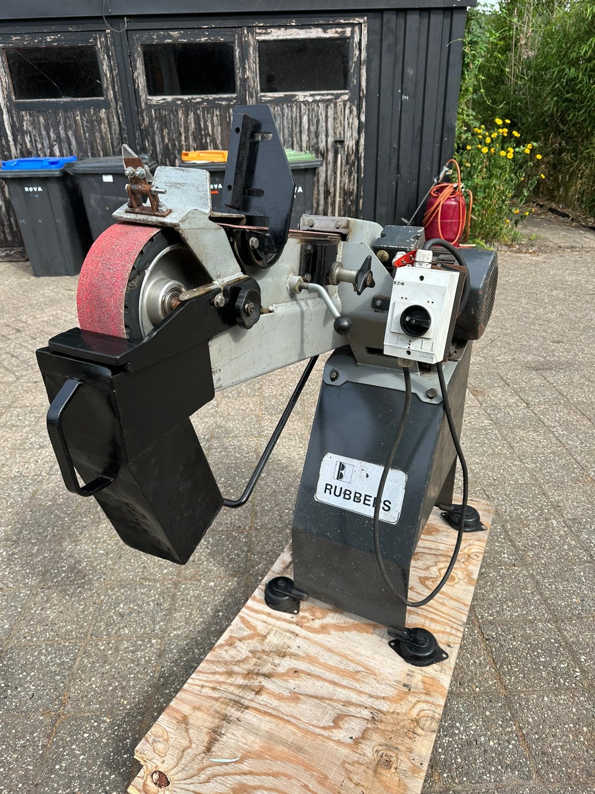 Metaal bandschuurmachine, Ophalen