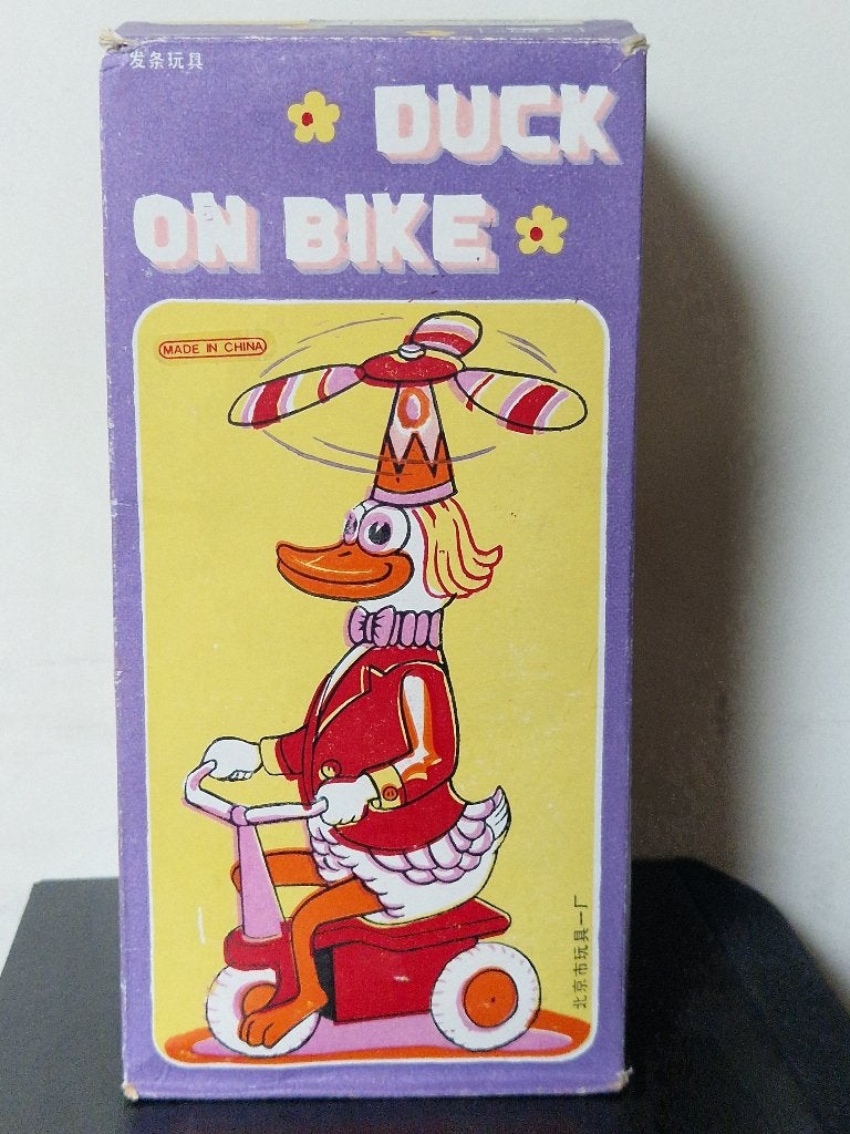 Vintage metalen opwind speelgoed `Duck on Bike`, Ophalen of Verzenden, Zo goed als nieuw