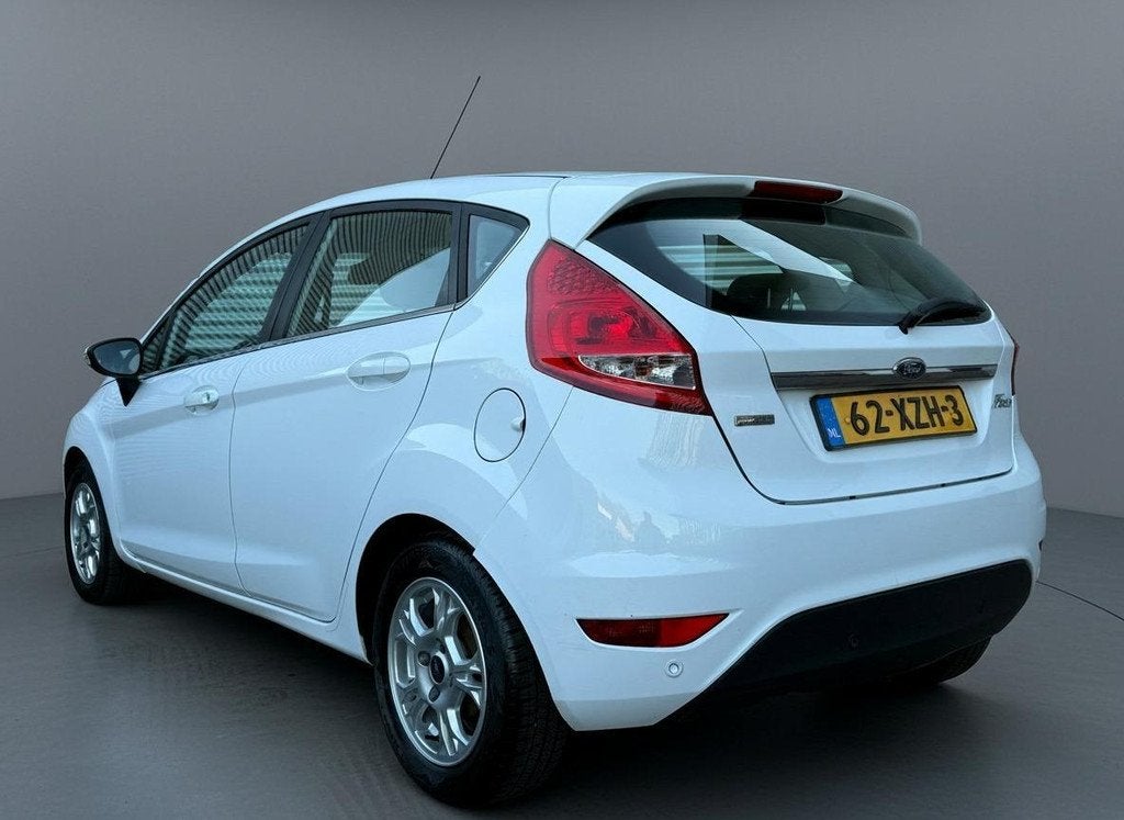 Ford Fiesta 1.6 TDCi ECOnetic Lease Titanium Airco Cruise 12, Auto's, Voorwielaandrijving, Stof, Gebruikt, Zwart