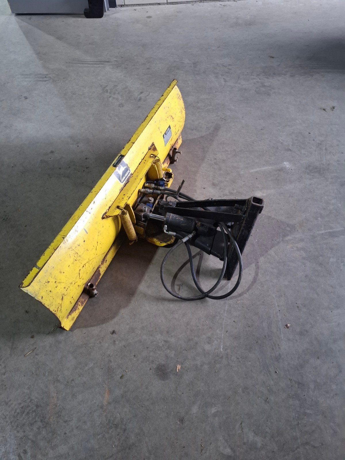 john deere sneeuwschuif, Ophalen