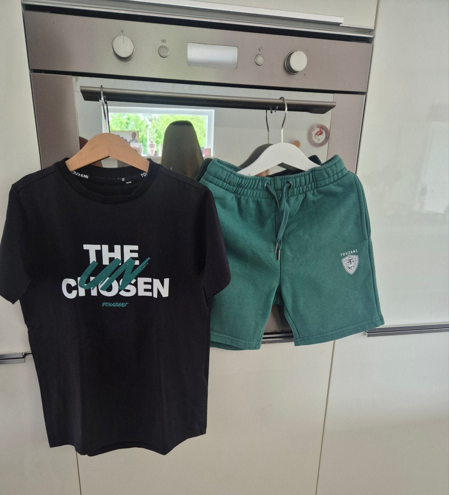 Touzani korte broek en shirtje maat 134-140, Ophalen of Verzenden, Zo goed als nieuw, Setje, Touzani