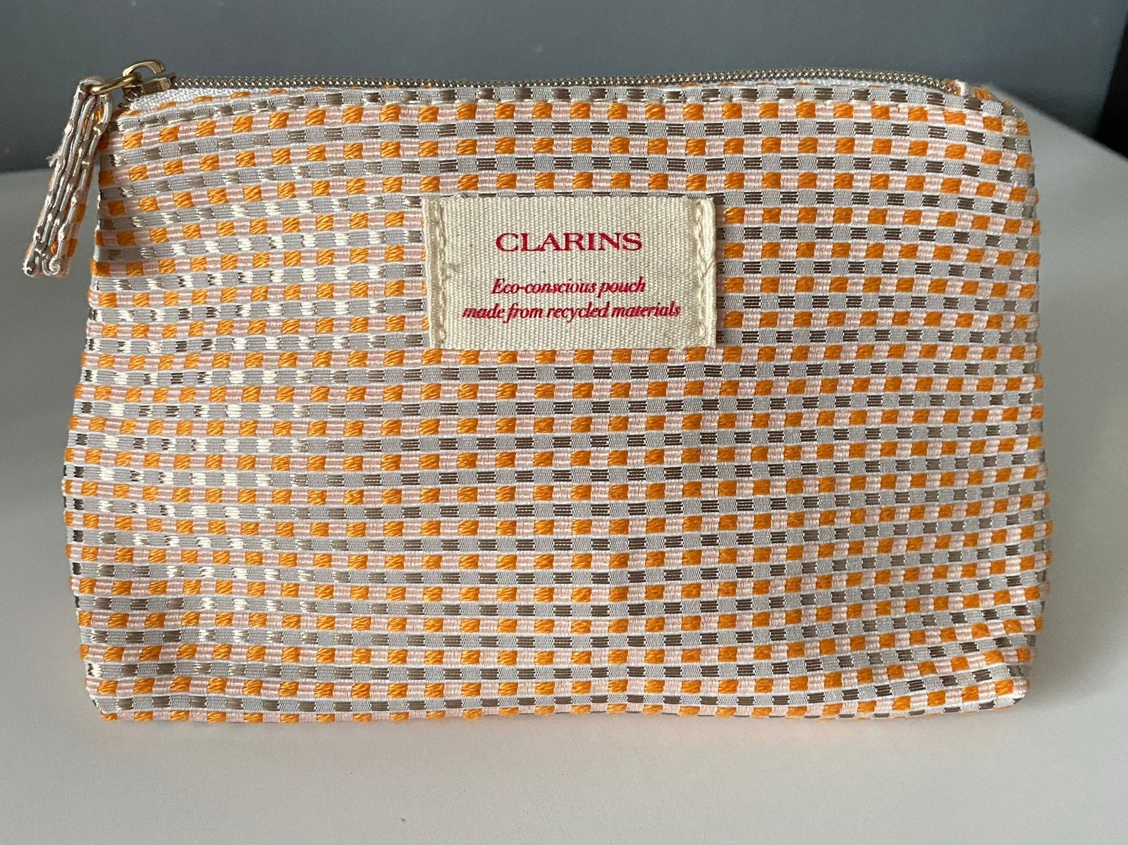 Clarins Toilettas /Make-Up tasje - Goud met Oranje - Nieuw, Verzenden, Nieuw, Oranje, Heer of Dame