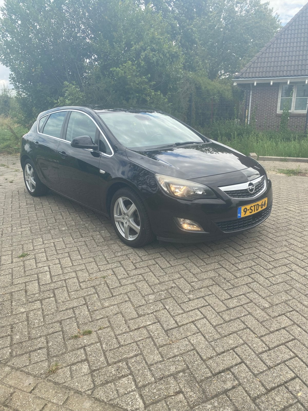 Opel Astra 1.4 Turbo Ecotec 103KW 5-D 2011 Zwart, Auto's, Voorwielaandrijving, Stof, 4 cilinders, Zwart