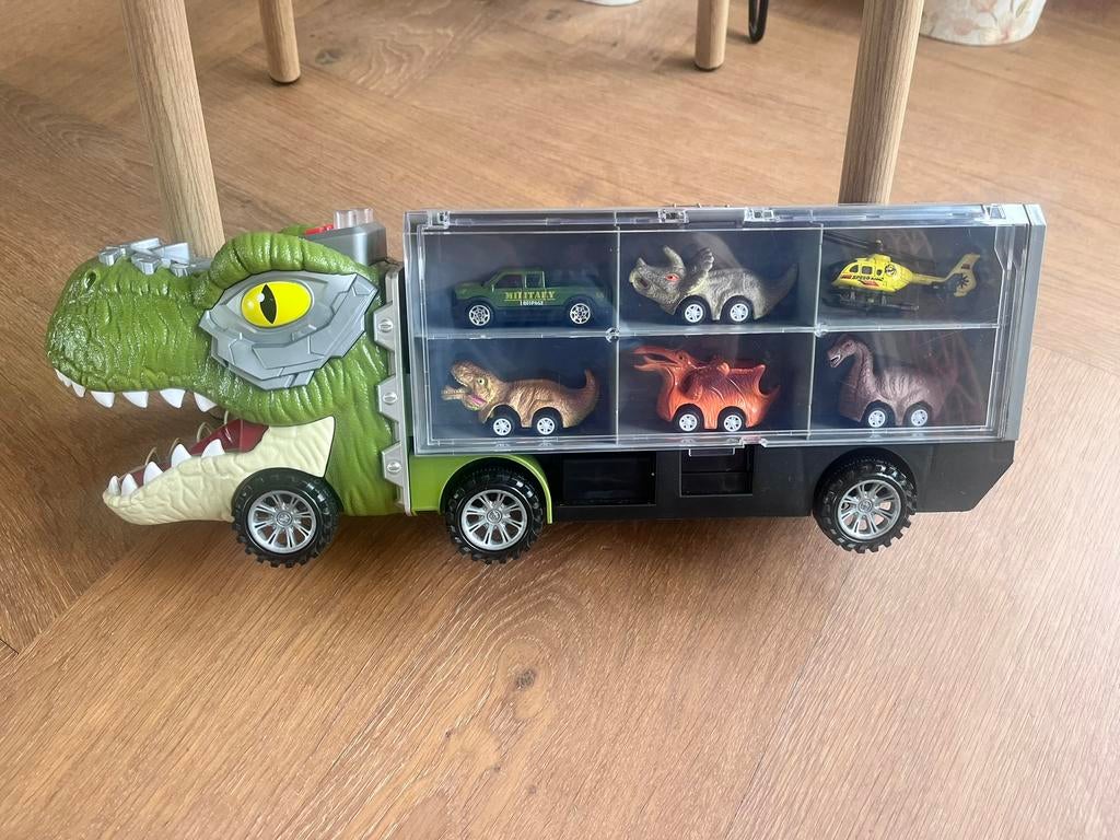 Dinosaurus speelgoed truck met 6 kleine auto’s / helicopter, Ophalen of Verzenden, Zo goed als nieuw