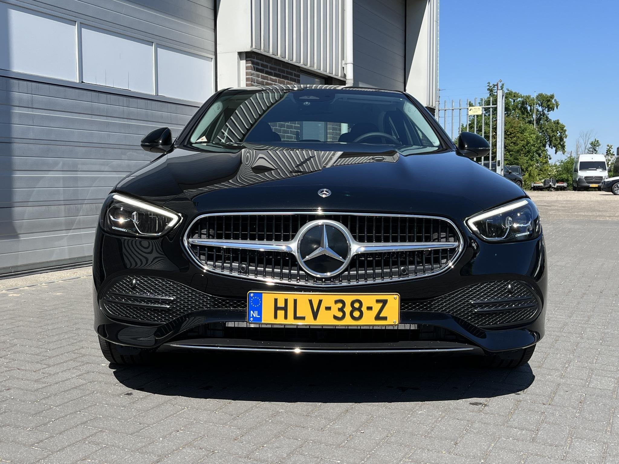 Mercedes-Benz C-klasse 300 e Business Line | Trekhaak | Appl, Auto's, Automaat, 4 cilinders, Leder en Stof, Zwart