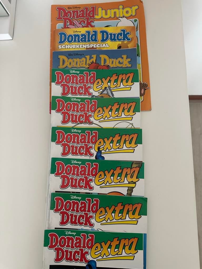 Donald Duck Extra en Donald Duck Junior - 9 stuks, Meerdere stripboeken, Ophalen of Verzenden, Gelezen