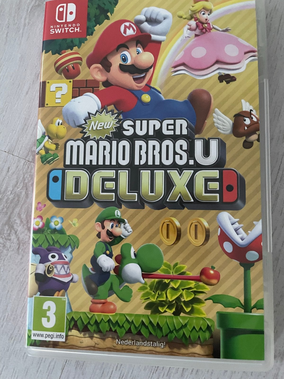 New Super Mario Bros. U Deluxe (Nintendo Switch), Spelcomputers en Games, Games | Nintendo Switch, Ophalen, Nieuw, Eén computer