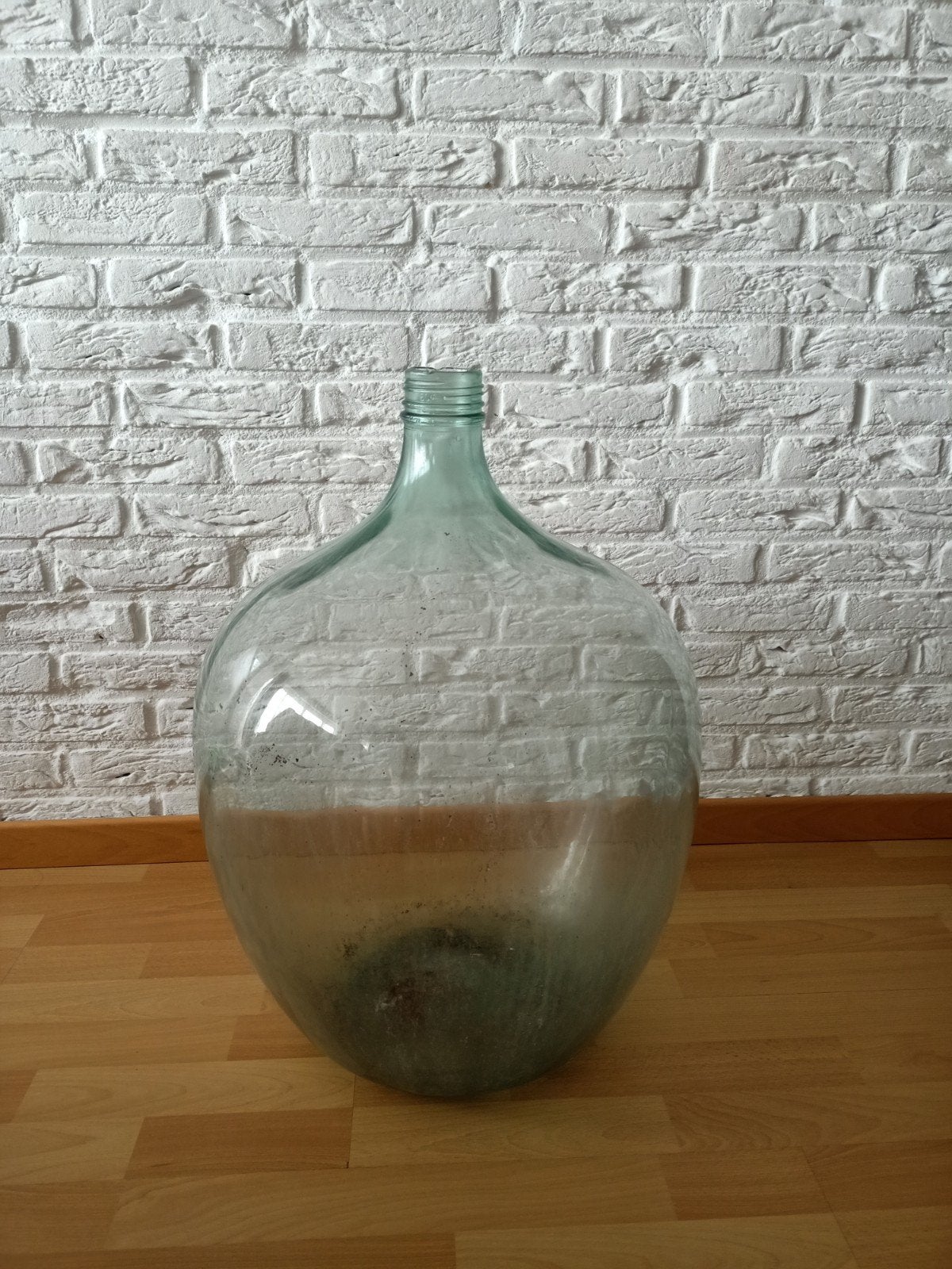 Glazen wijn vat, Ophalen