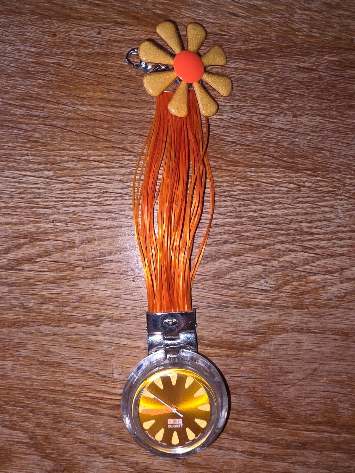 Swatch Pop horloge met oranje band en bloemhanger, Kunststof, Gebruikt, Polshorloge, Swatch