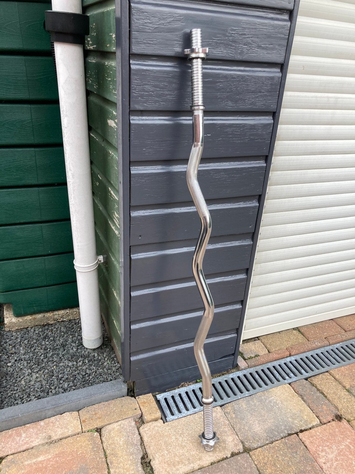 Curled barbell, Ophalen, Zo goed als nieuw, Krachtstation