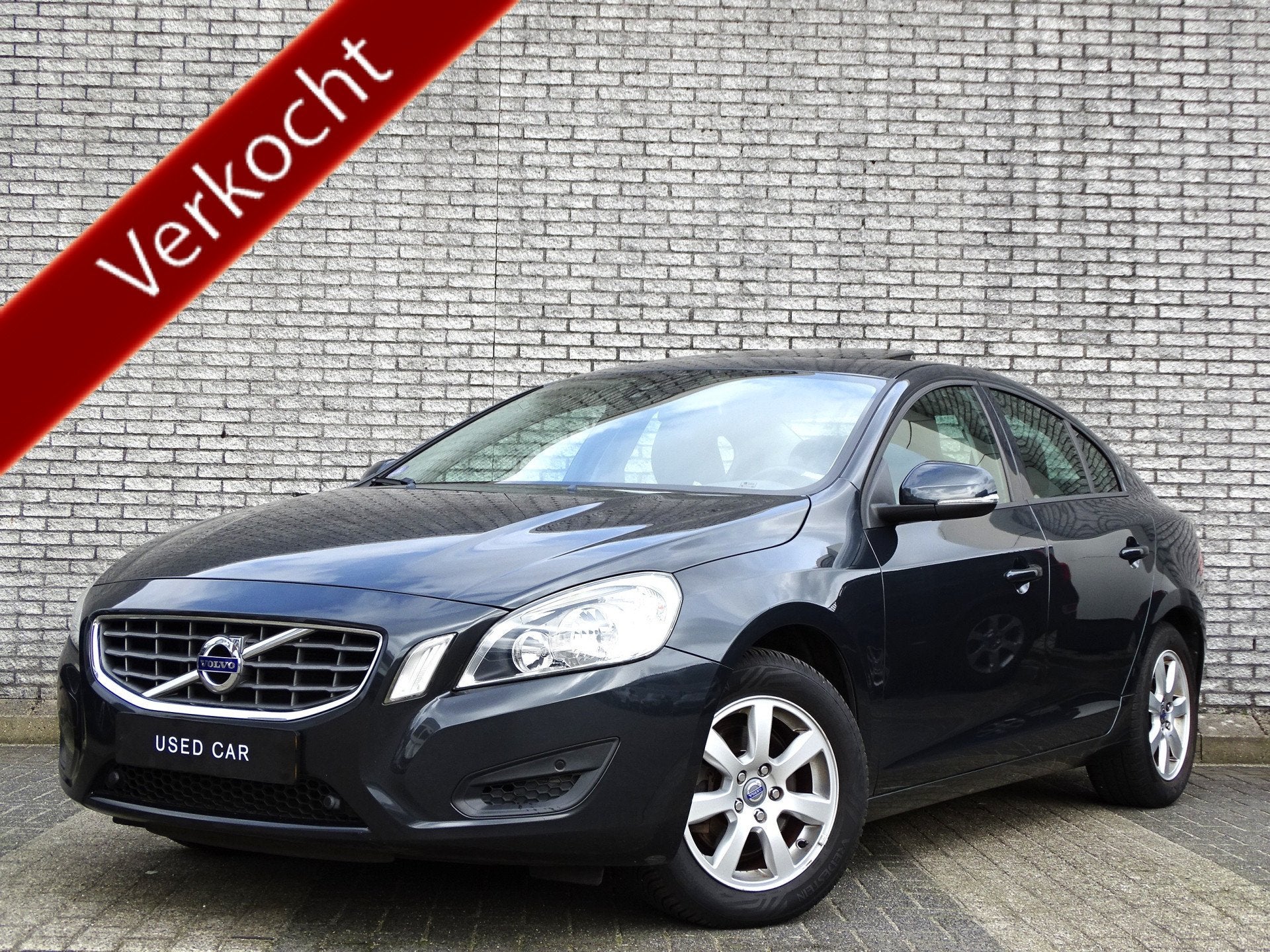 Volvo S60 1.6 T4F Kinetic | Leder | Trekhaak | Schuif- / kan, Auto's, Gebruikt, Zwart, Met garantie (alle), 179 pk