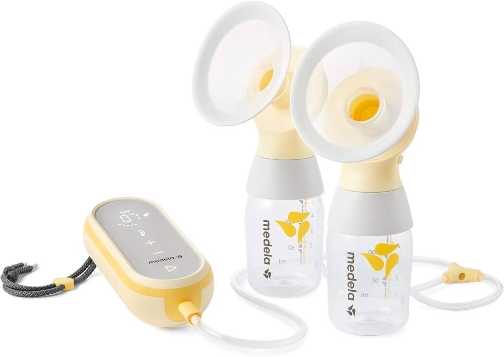 Medela Dubbele Elektrische Borstkolf, Ophalen of Verzenden, Zo goed als nieuw