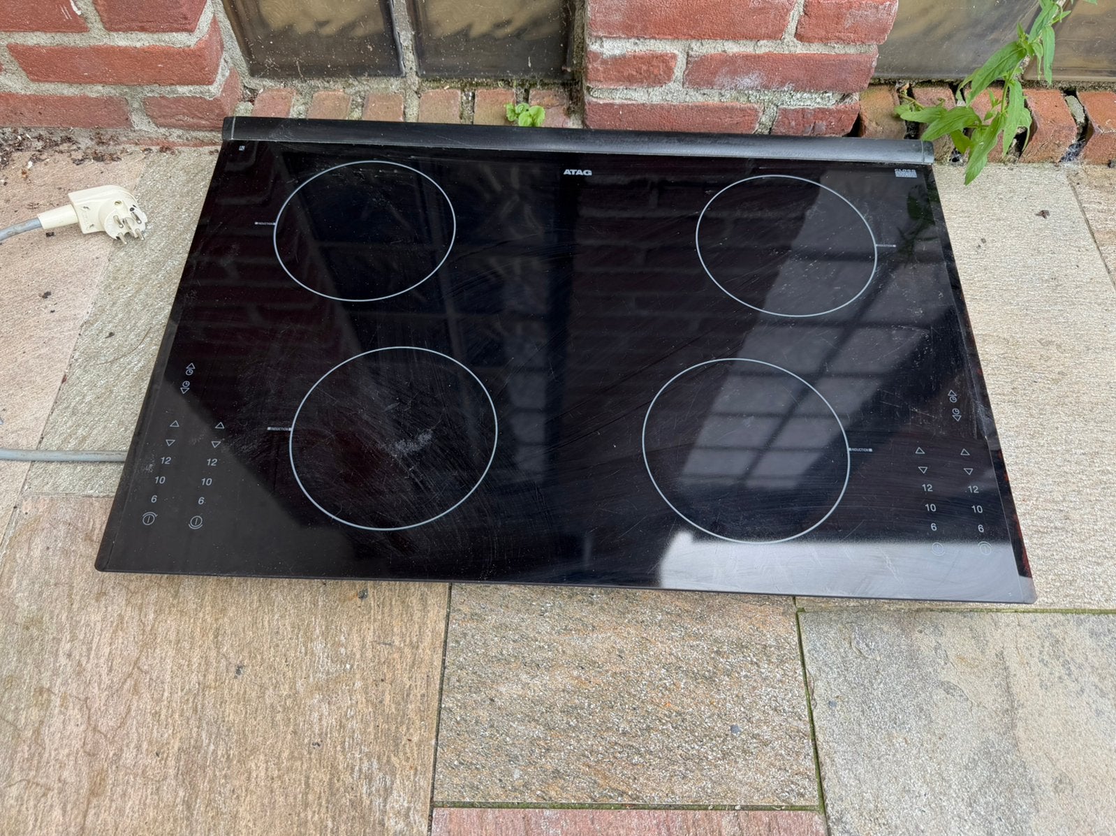 ATAG Inductiekookplaat 60 cm – Werkend uitgebouwd, Ophalen of Verzenden, Gebruikt