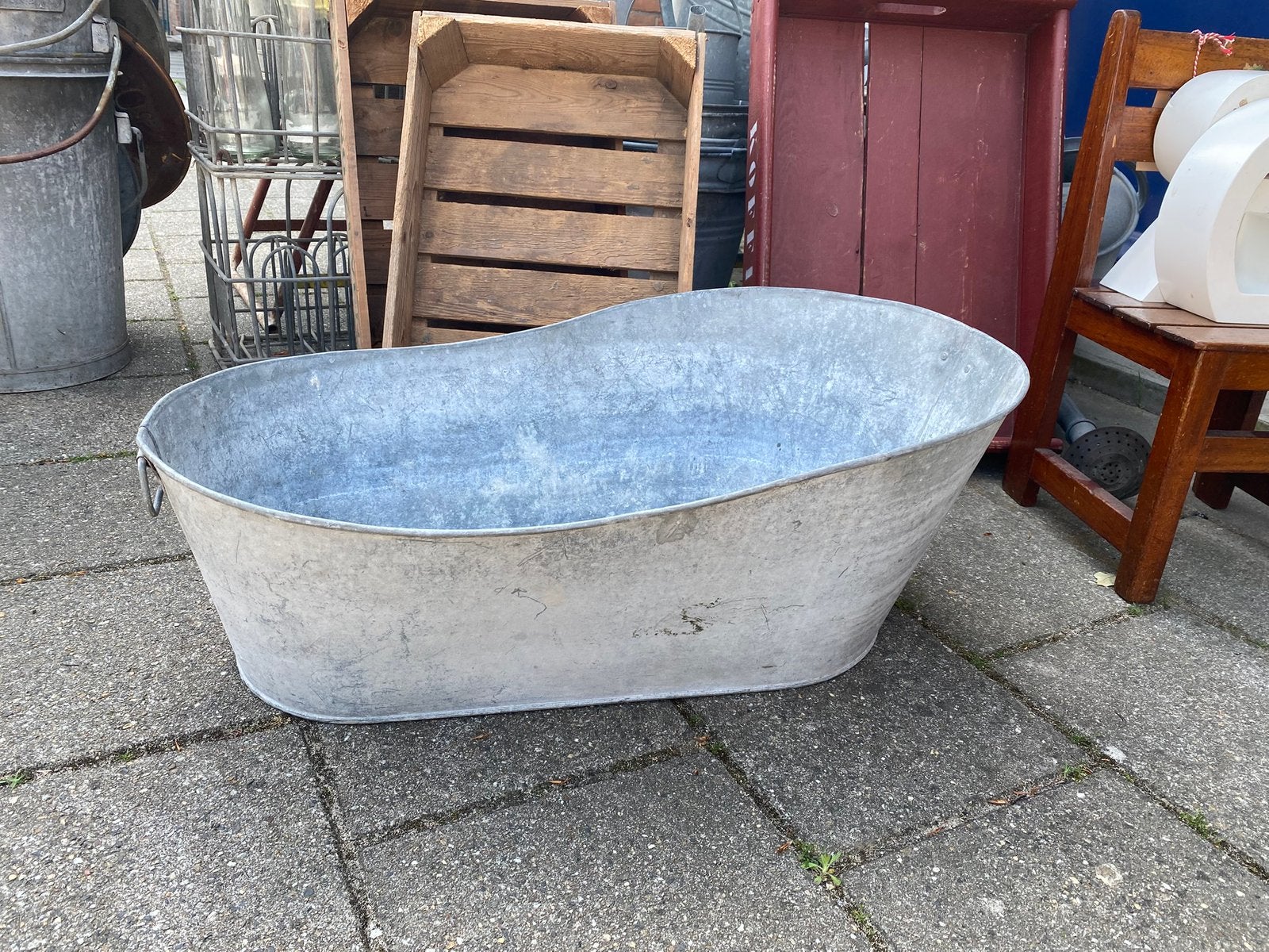 Zinken kinderbadje, Ophalen