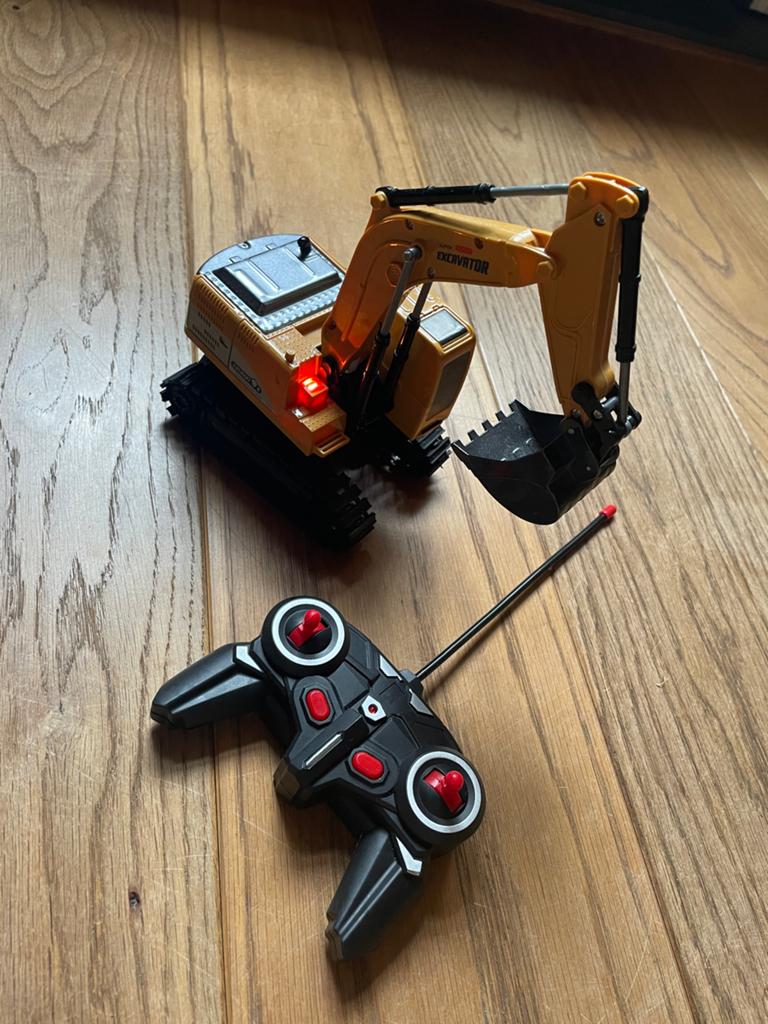 RC Afstandsbestuurbare Graafmachine met Licht en Geluid, Ophalen of Verzenden, Zo goed als nieuw, Overige schalen, Elektro